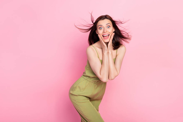 Photo of hooray brunette lady wear khaki overall isolated on pink color background. - Fotografie, Obrázek