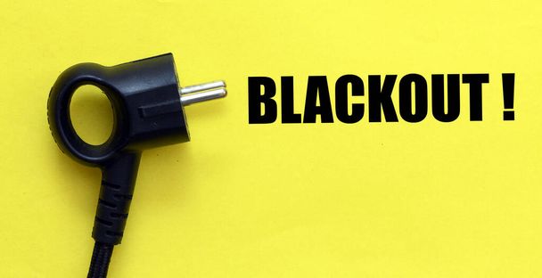 The word BLACKOUT on a yellow background. - Photo, Image