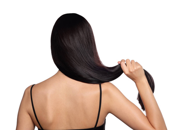 Woman with strong healthy hair on white background, back view - Φωτογραφία, εικόνα