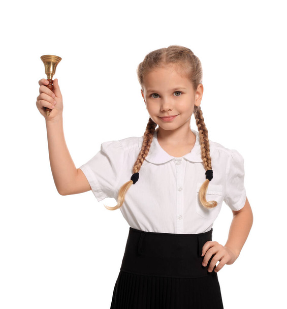 Pupil with school bell on white background - Foto, Bild