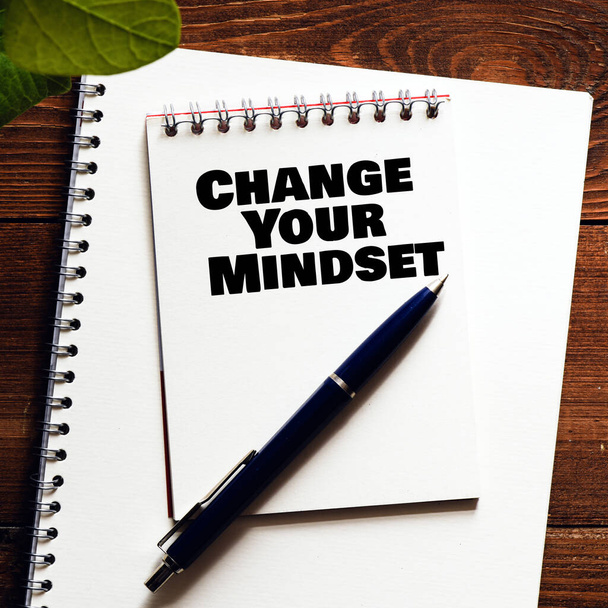 Change Your Mindset text notepad and on office wooden table - Valokuva, kuva