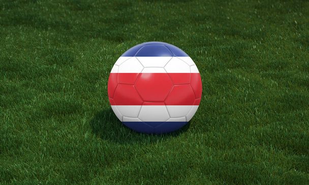 緑の草の背景にスタジアムでコスタリカの旗の色を持つサッカーボール。3Dイラスト. - 写真・画像