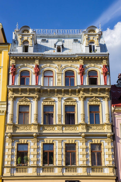 Front facade of yellow historic house in Liberec, Czech Republic - Foto, Bild