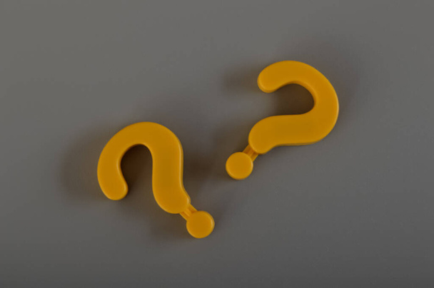 Question mark symbols isolated on a grey background - Photo, Image
