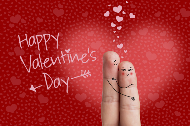 Lovers embrasse et embrasse. Happy Valentine's Day theme series. Image de stock. Un couple heureux amoureux avec un sourire peint et câlin
 - Photo, image