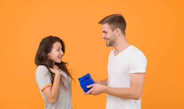 Making her happy. Happy birthday. Man give box to birthday girl. Birthday anniversary. Couple in love. Holiday celebration. Shopping birthday gift. Present shopping. Special day. Happiness is real. - Фото, зображення