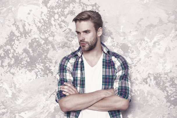 good man hard to find. mens sensuality. sexy guy casual style. macho man grunge wall. male fashion summer trend. confident student checkered shirt. unshaven man care beard. barbershop concept. - 写真・画像