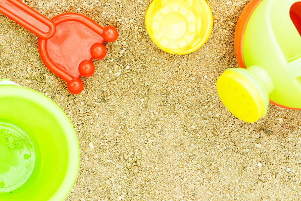 colorful plastic toys for the beach on sand - Foto, Imagen