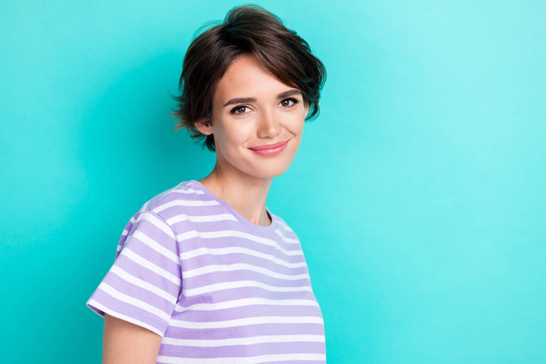 Photo of cute adorable lady wear violet t-shirt smiling empty space isolated turquoise color background. - Valokuva, kuva