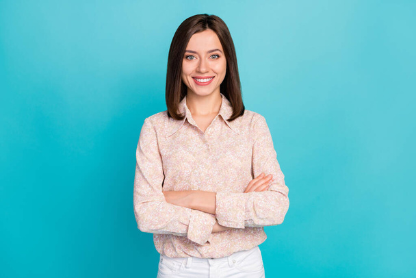 Photo portrait of charming young lady confident crossed arms dressed stylish smart casual clothes isolated on aquamarine color background. - 写真・画像