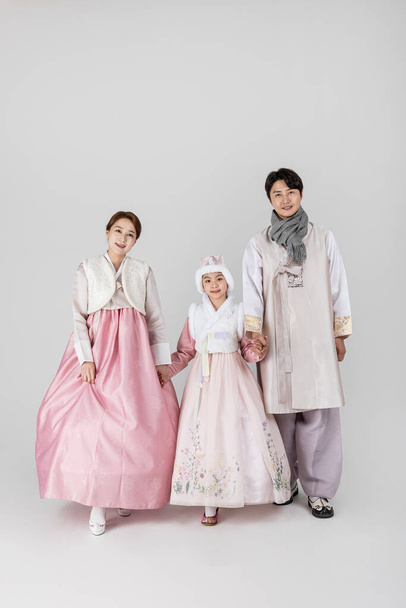 Korean family in Hanbok, isolated white background - Foto, imagen