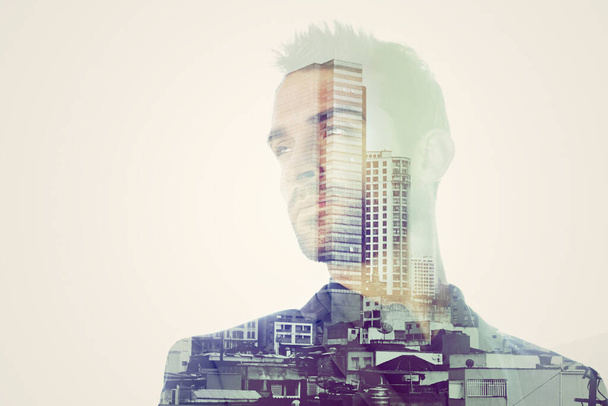 Urban man at heart. Composite image of a well-dressed man superimposed on an image of a city - Foto, Imagem
