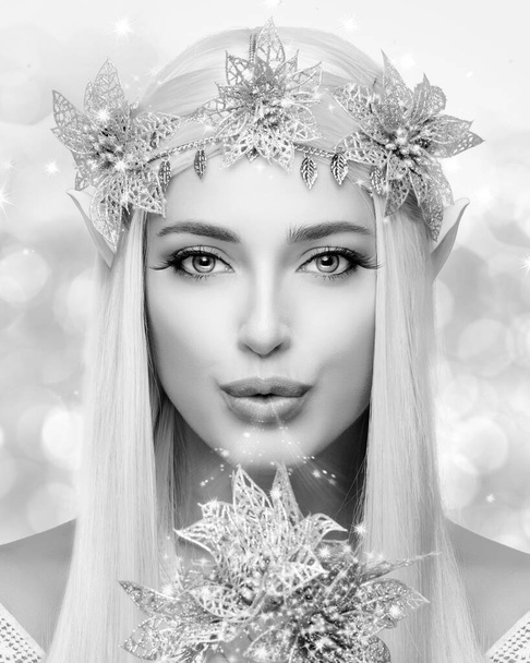 Beautiful woman as a magical fairy for a carnival celebration. Monochrome beauty face portrait in vertical format - Photo, Image