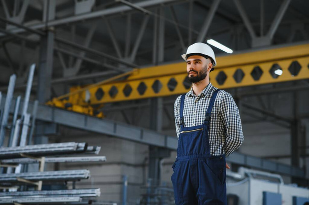 Portrait of Young Professional Heavy Industry Engineer. - 写真・画像