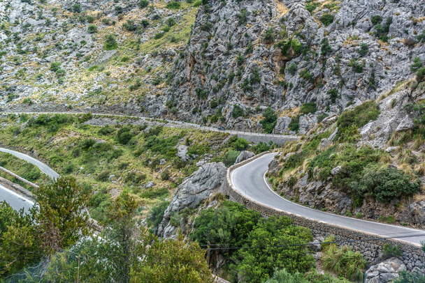 winding road in the mountains on the way to sa calobra, spain  - 写真・画像