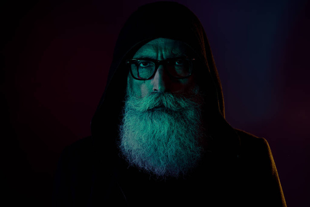 Close up photo of gloomy strict pensioner wear robe cloak mysterious ritual steal santa claus isolated on dark gradient color background. - Φωτογραφία, εικόνα