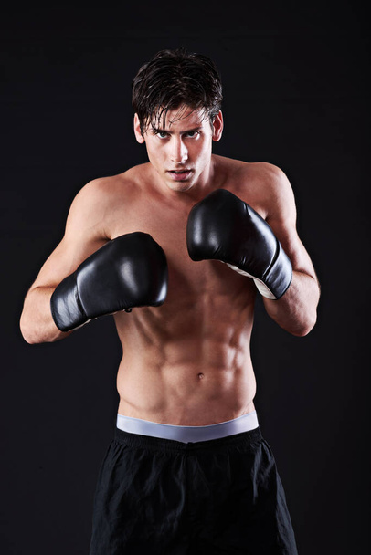 Are you up to the challenge. Studio shot of a young mixed martial artist - Фото, изображение