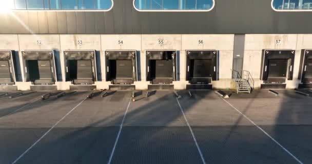 Truck dock platform. Cargo loading paltform for trucks. Logistics distribtion warehouse, Import and export process loading terminal. Cargo delivery container building. Aerial - Footage, Video
