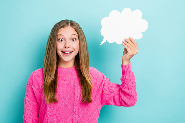Photo of excited teenager open mouth shocked hold paper cloud unexpected genius idea solution problems isolated on blue color background. - Фото, изображение