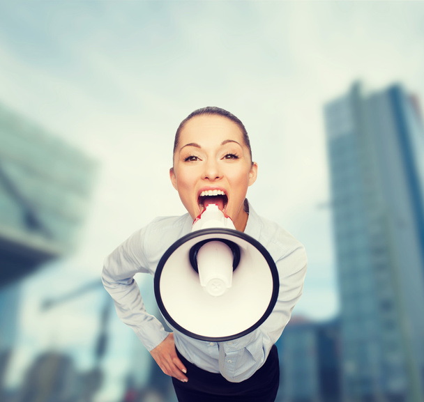 screaming businesswoman with megaphone - Photo, Image