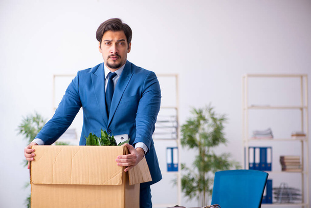 Young businessman employee in business relocation concept - Photo, Image