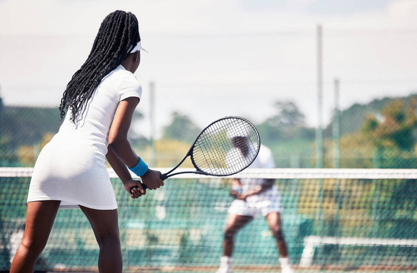 Tennis, team game and african couple workout competition, sports exercise or outdoor wellness. Tennis court, athlete tennis player and african woman with racket for competition or teamwork fitness. - Foto, Imagen