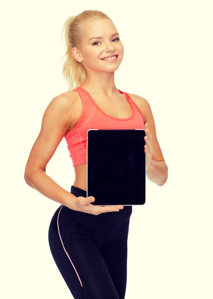 smiling woman showing tablet pc blank screen - Photo, image