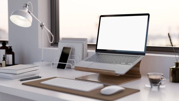 Сучасний офісний стіл або домашній робочий стіл з портативним комп'ютером білий екран макет на підставці для ноутбуків, бездротова клавіатура та аксесуари на білому столі. крупним планом. 3D візуалізація, 3d ілюстрація
 - Фото, зображення