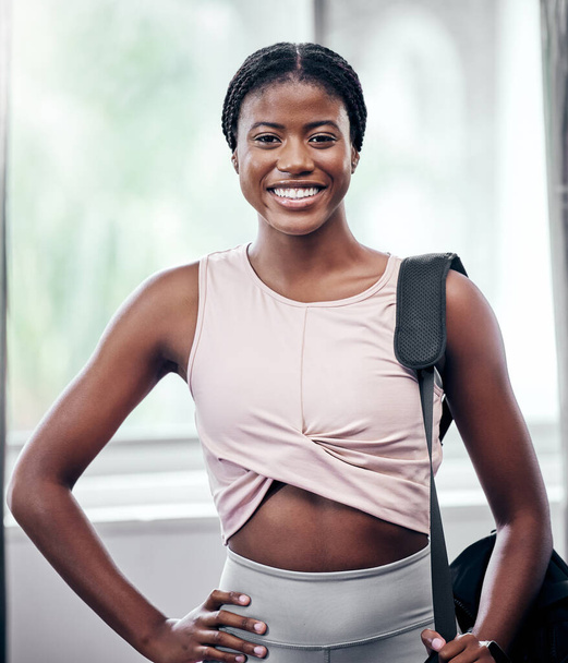 Happy black woman, portrait and bag for gym, training or workout for health, self care and fitness. Woman, african and smile before training, exercise or wellness for self love with happiness on face. - Foto, imagen