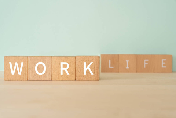 WORK, Work-life balance; Wooden blocks with "WORK" text of concept. - Fotografie, Obrázek
