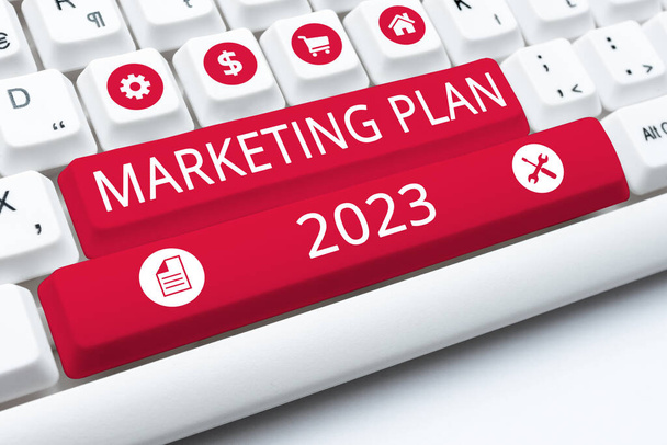 Scrittura visualizzazione del testo Piano di Marketing 2023, Programma vetrina aziendale che definisce il modo di vendita del marchio nel prossimo anno - Foto, immagini