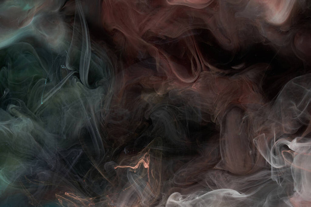 Contrasting multicolored ink abstract background. Acrylic paint backdrop for perfume, hookah, cosmetics. Mysterious smoke clouds, colorful fog - Fotoğraf, Görsel
