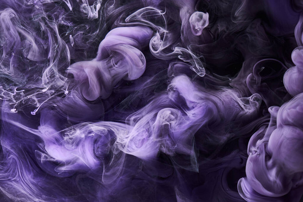 Purple lilac multicolored smoke abstract background, acrylic paint underwater explosion - Foto, Imagen