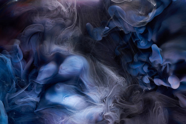 Blue ink abstract background. Acrylic paint backdrop for perfume, hookah, cosmetics. Mysterious smoke clouds, colorful fog - Foto, Imagem