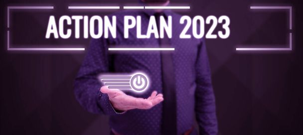 Texto del pie de foto que presenta el Plan de Acción 2023, Idea de negocios para hacer la lista contiene el número de cosas que se harán el próximo año - Foto, Imagen