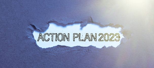 Escribiendo mostrando texto Plan de Acción 2023, escaparate de negocios para hacer lista contiene el número de cosas que se harán el próximo año - Foto, imagen