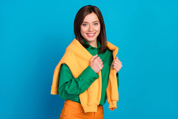 Photo of pretty cute lady wear orange green outfit ready walk outside enjoy nice autumn weather isolated on blue color background. - Foto, Imagem