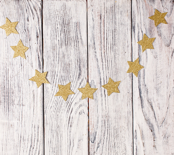 Christmas stars on  wooden background - Foto, Imagem