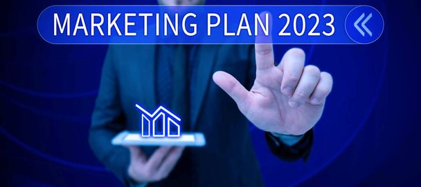 Scrivere la visualizzazione del testo Piano di Marketing 2023, Business idea di pianificazione che definisce il marchio modo di vendita nel prossimo anno - Foto, immagini