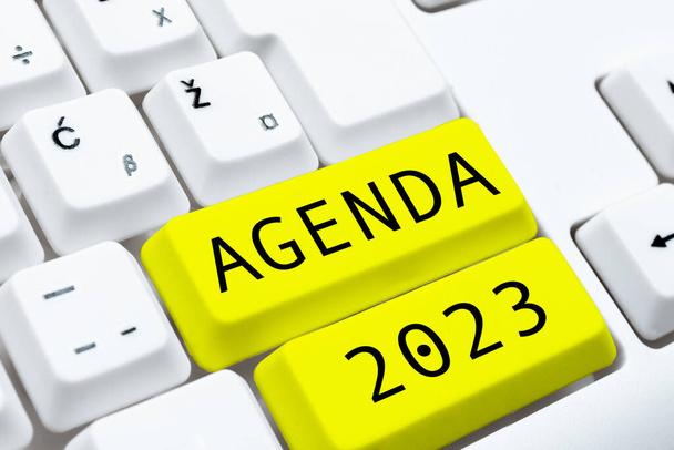 Ispirazione che mostra il segno Agenda 2023, Parola Scritto sull'elenco delle attività in modo che siano riprese - Foto, immagini