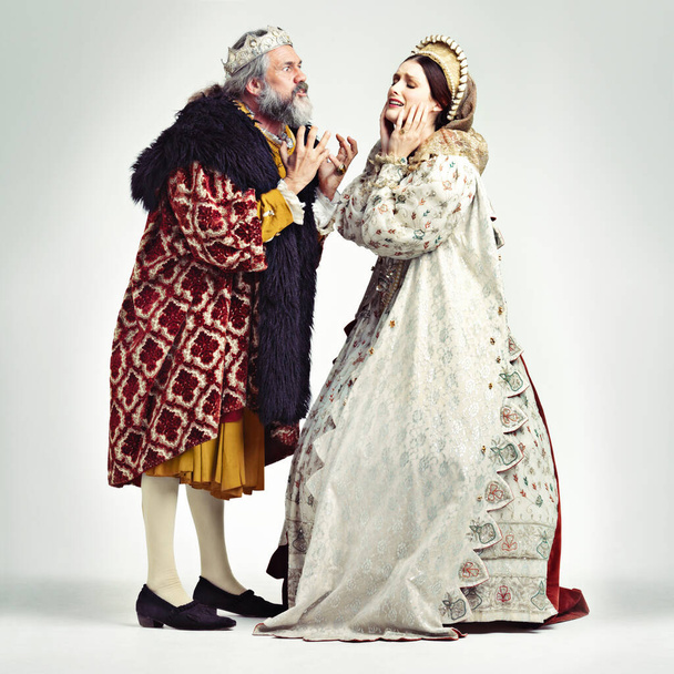 Dont say such things mlord. Studio shot of a king and queen arguing - Zdjęcie, obraz