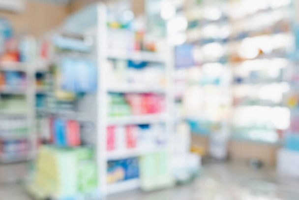 Pharmacy blurred abstract background qualified drug, medicinal product on shelf background. Blurry light tone wallpaper of drugstores interior medications displayed on shelves for healthcare concept. - Photo, Image