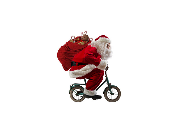 Santaclaus jeździ na rowerze, aby dostarczyć szybkie prezenty świąteczne - Zdjęcie, obraz