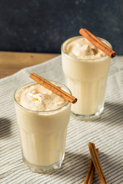 Frozen Creamy Eggnog Milkshake with Cinnamon in a Glass - 写真・画像