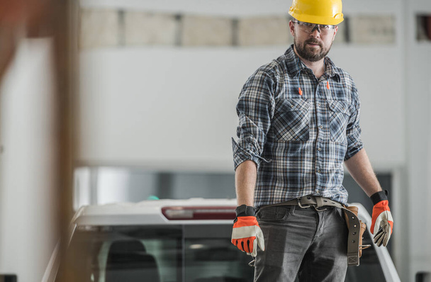 Professional Caucasian Contractor in His 30s Standing Indoors at Construction Site of Commercial Building Confidently Looking Ahead. - Photo, Image