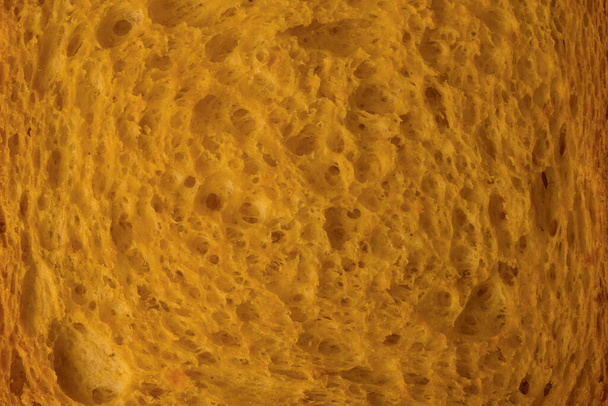 Close up shot of a rusk background texture. Macro bread slice texture pattern - Photo, Image
