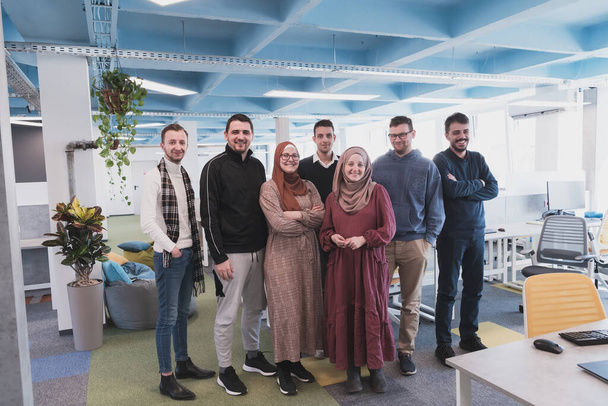Portrait of a successful creative business team looking at camera and smiling. Diverse business people standing together at startup - Foto, Bild