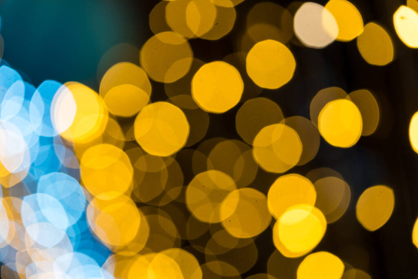 Bokeh glows the concept of Celebration, Christmas or festival seasonal background. - Foto, Bild