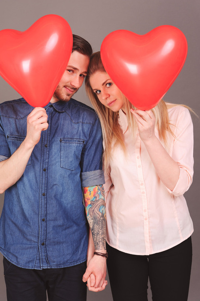 Couple in love with heart balloons - Foto, imagen