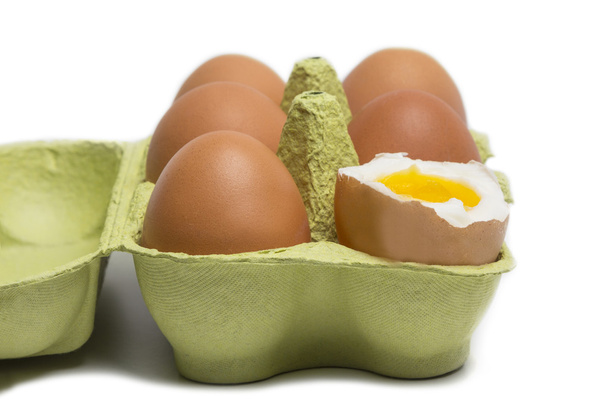 Box of Eggs with one broken boiled egg - Photo, Image